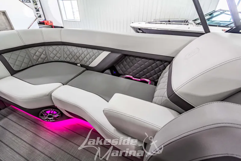 Slide: The Image of Luxurious interior of 2025 Godfrey AquaPatio 255 SBC with pink LED lighting. - 45