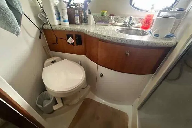 Slide: The Image of Bathroom interior of 2001 Carver 396 Motor Yacht with sink and toilet. - 23