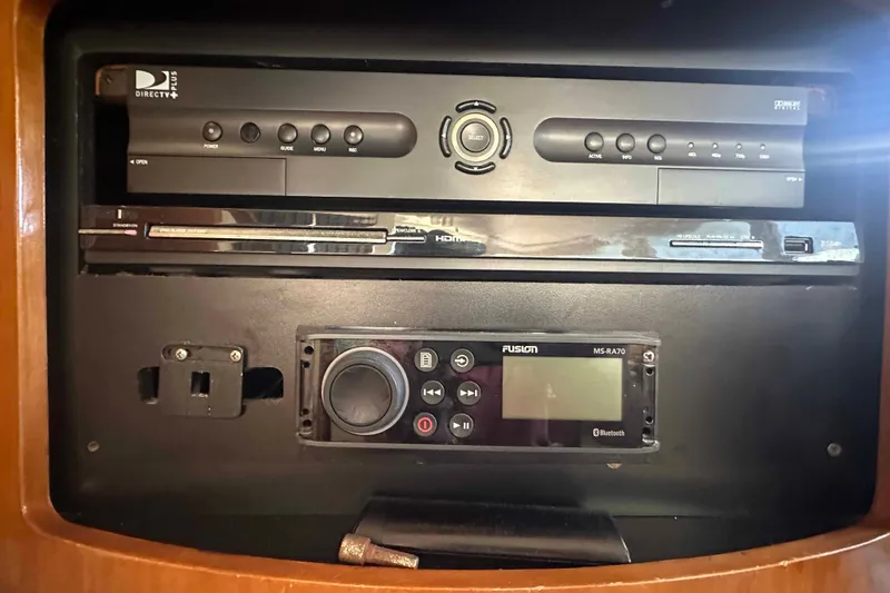 Slide: The Image of Entertainment system in a 2001 Carver 396 Motor Yacht with DirectTV and Fusion audio. - 29