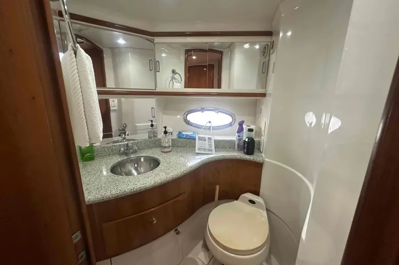 Slide: The Image of Luxurious bathroom in 2001 Carver 396 Motor Yacht with granite countertop and modern fixtures. - 27