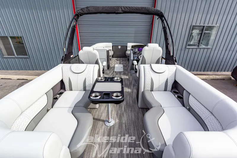 Slide: The Image of 2025 Godfrey Monaco 235 SB pontoon boat with luxurious seating and modern design. - 31
