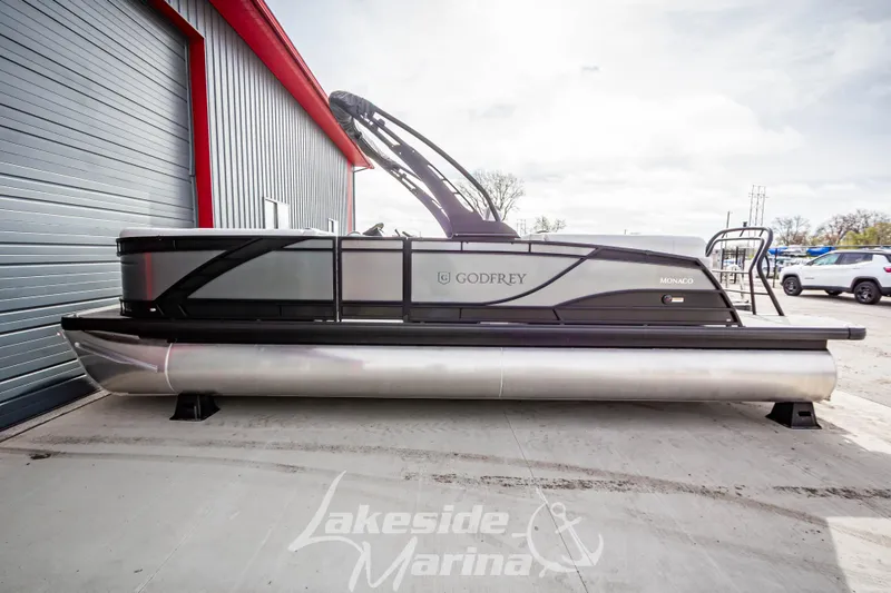 Slide: The Image of 2025 Godfrey Monaco 235 SB pontoon boat at Lakeside Marina. - 6