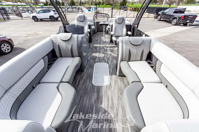 Slide: The Image of Luxurious interior of 2025 Godfrey Monaco 235 SB pontoon boat with plush seating. - 8