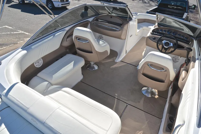 Slide: The Image of Interior of 2008 Cobalt 222 boat with beige and white seating. - 19