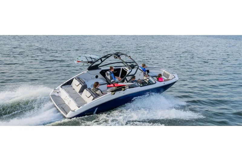 Slide: The Image of 2025 Yamaha Boats 252XE cruising on water with passengers enjoying the ride. - 10