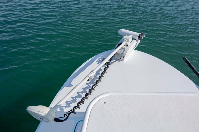 Slide: The Image of Bow of 2015 East Cape Fury boat with trolling motor on calm water. - 16