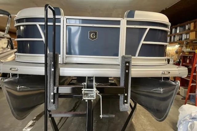 Slide: The Image of Interior of 2026 Sweetwater 2286C pontoon boat with modern dashboard and seating. - 12