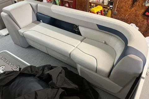 Slide: The Image of 2026 Sweetwater 2286C boat seating in a workshop setting. - 20