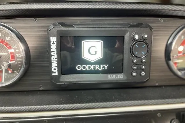 Slide: The Image of 2026 Sweetwater 2286C pontoon boat in storage, featuring sleek design and modern amenities. - 4