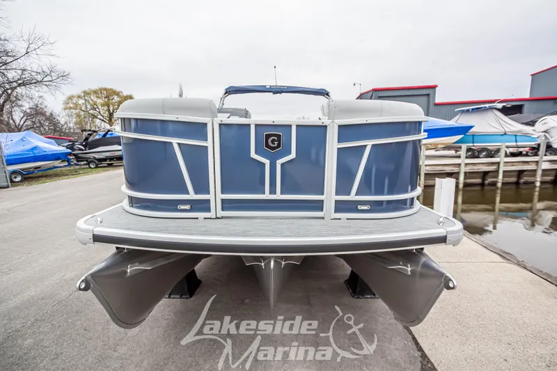 Slide: The Image of 2025 Godfrey Monaco 235 SFL pontoon boat at Lakeside Marina dock. - 10