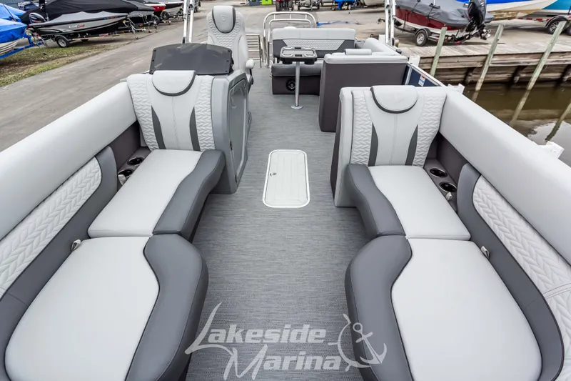 Slide: The Image of 2025 Godfrey Monaco 235 SFL pontoon boat interior with luxurious seating and modern design. - 11