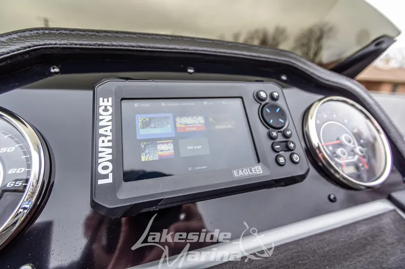 Slide: The Image of Dashboard of 2025 Godfrey Monaco 235 SFL with Lowrance navigation system. - 22