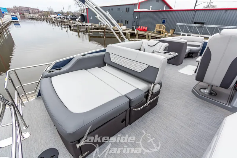 Slide: The Image of 2025 Godfrey Monaco 235 SFL boat interior with luxurious seating at Lakeside Marina. - 31