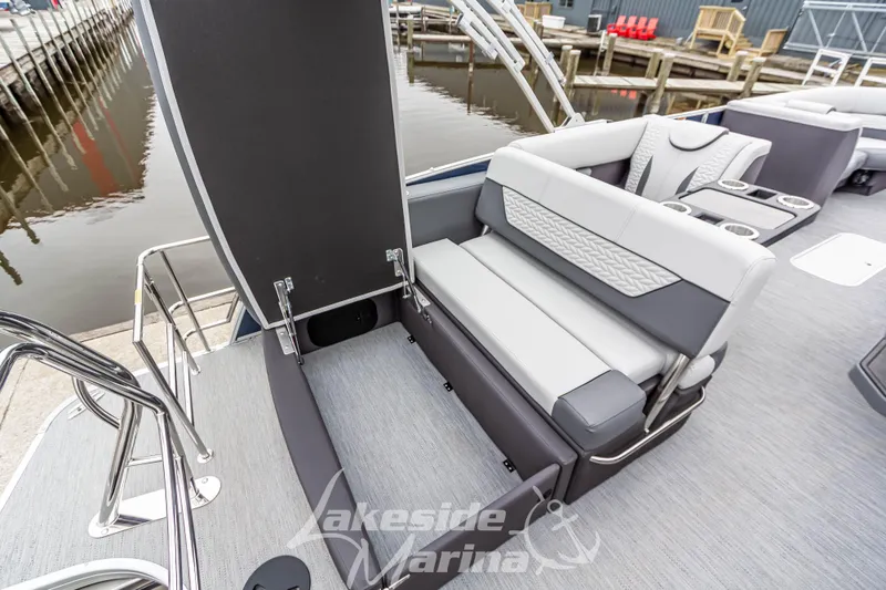 Slide: The Image of 2025 Godfrey Monaco 235 SFL boat interior with luxurious seating and storage. - 32