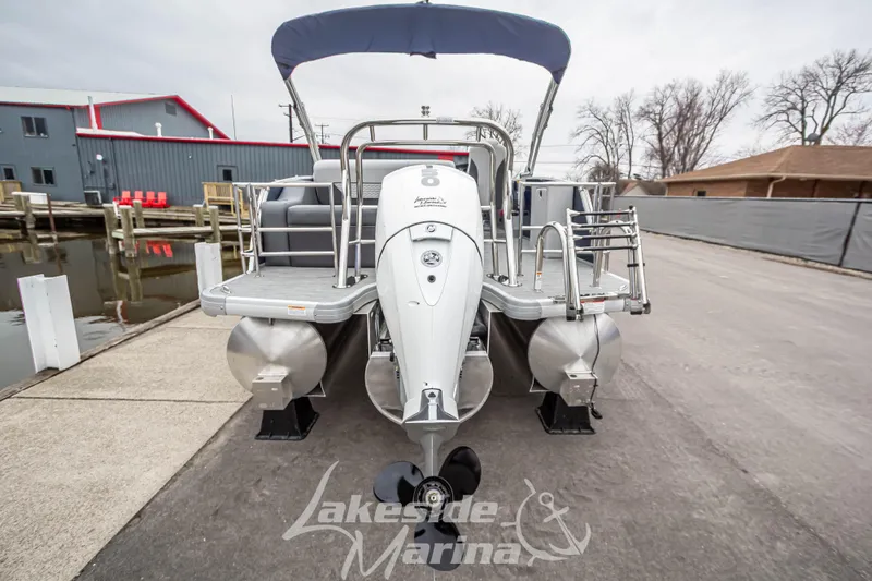 Slide: The Image of 2025 Godfrey Monaco 235 SFL pontoon boat at marina dockside. - 6