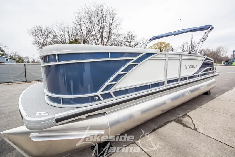 Slide: The Image of 2025 Godfrey Monaco 235 SFL pontoon boat at Lakeside Marina, showcasing sleek design and modern features. - 9