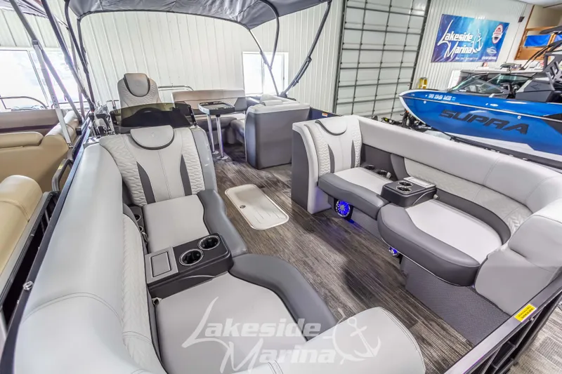 Slide: The Image of 2025 Godfrey Monaco 235 SFL pontoon boat interior with luxurious seating and modern design. - 10