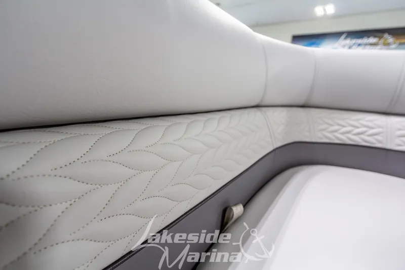 Slide: The Image of Luxurious seating detail of 2025 Godfrey Monaco 235 SFL boat interior. - 14