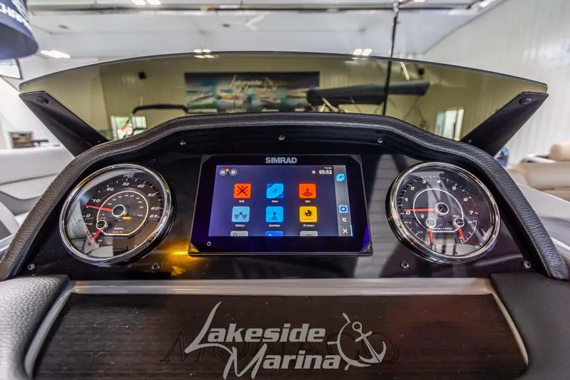 Slide: The Image of Dashboard of 2025 Godfrey Monaco 235 SFL with Simrad display and gauges. - 17