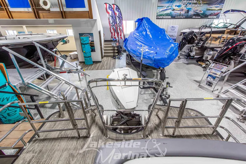 Slide: The Image of 2025 Godfrey Monaco 235 SFL boat displayed at Lakeside Marina showroom. - 27
