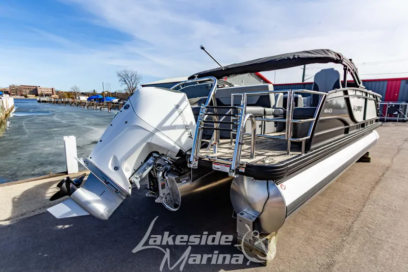 Slide: The Image of 2025 Godfrey Monaco 235 SFL pontoon boat docked at Lakeside Marina. - 4