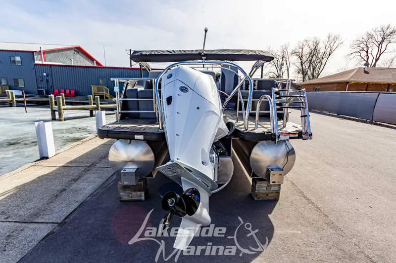 Slide: The Image of 2025 Godfrey Monaco 235 SFL pontoon boat at Lakeside Marina, rear view. - 5