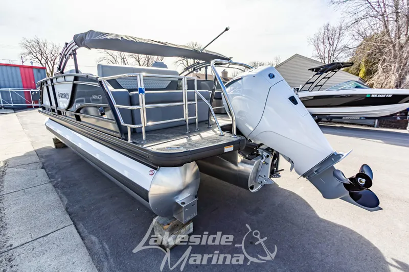 Slide: The Image of 2025 Godfrey Monaco 235 SFL pontoon boat with outboard motor at Lakeside Marina. - 6