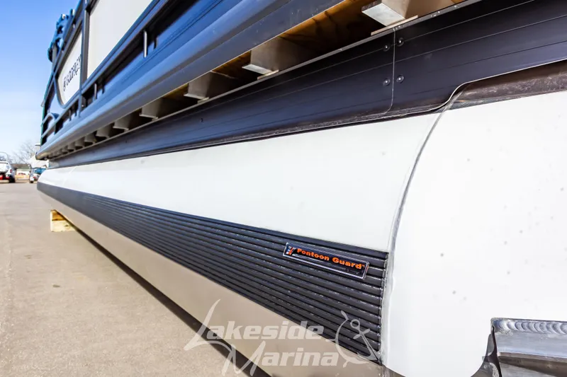 Slide: The Image of 2025 Godfrey Monaco 235 SFL pontoon boat with Pontoon Guard at Lakeside Marina. - 8