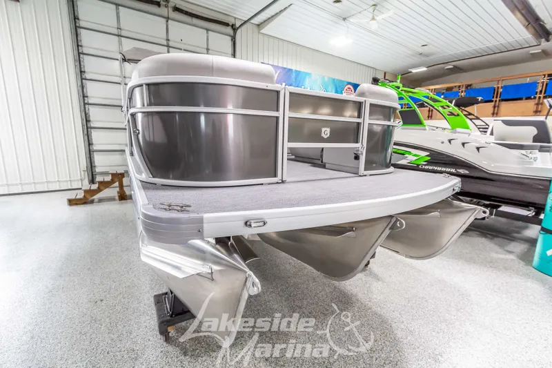 Slide: The Image of 2025 Godfrey Sweetwater 2286 FSX pontoon boat in showroom, sleek design, modern features. - 10