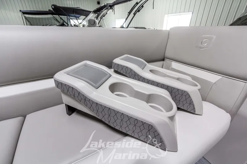 Slide: The Image of 2025 Godfrey Sweetwater 2286 FSX boat interior with cup holders and seating. - 15