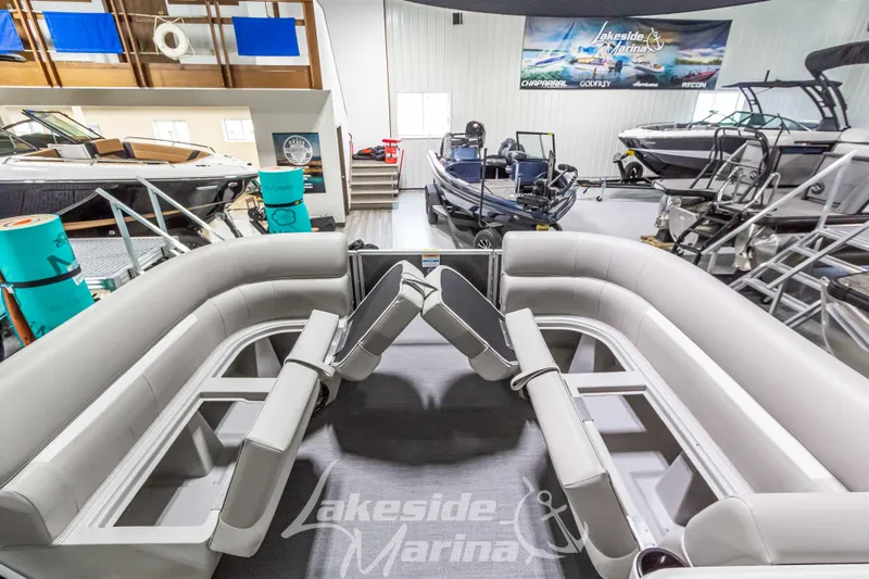 Slide: The Image of 2025 Godfrey Sweetwater 2286 FSX pontoon boat interior at Lakeside Marina showroom. - 16