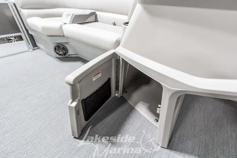 Slide: The Image of 2025 Godfrey Sweetwater 2286 FSX boat interior with open storage compartment. - 19