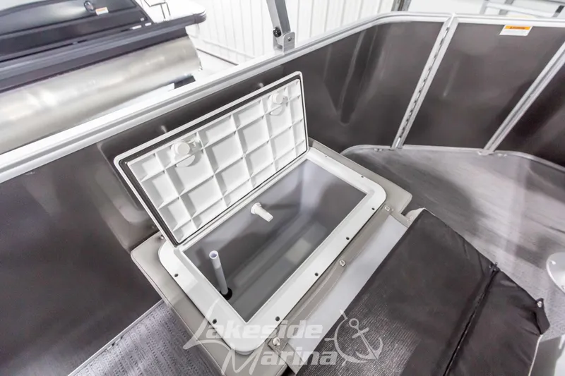 Slide: The Image of Open storage compartment on 2025 Godfrey Sweetwater 2286 FSX boat. - 30