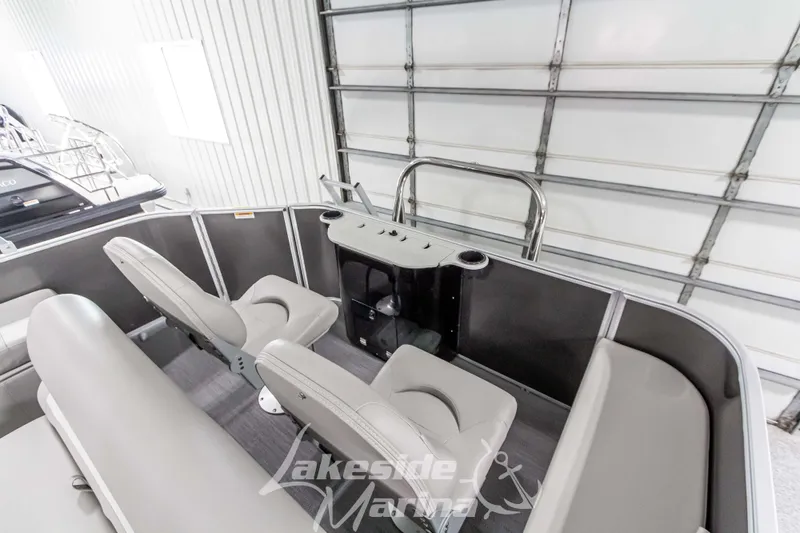 Slide: The Image of 2025 Godfrey Sweetwater 2286 FSX boat interior with seating and console. - 33