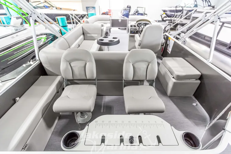 Slide: The Image of 2025 Godfrey Sweetwater 2286 FSX boat interior with seating and console. - 34