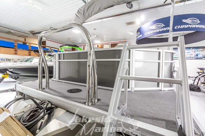 Slide: The Image of 2025 Godfrey Sweetwater 2286 FSX pontoon boat interior with ladder in showroom. - 4