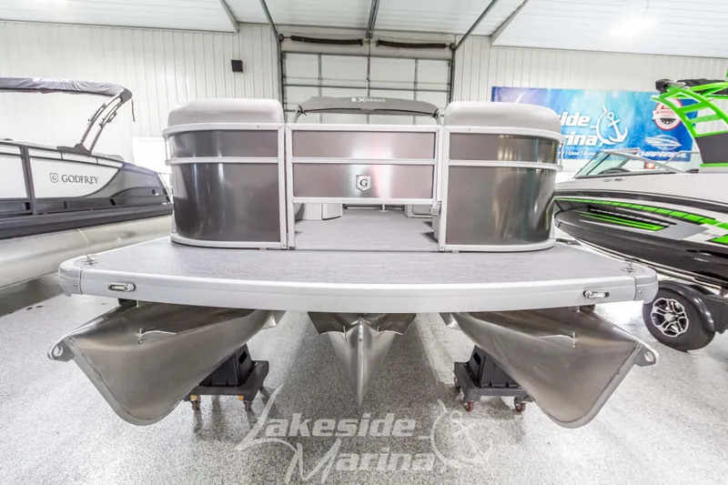 Slide: The Image of 2025 Godfrey Sweetwater 2286 FSX pontoon boat displayed at Lakeside Marina. - 9