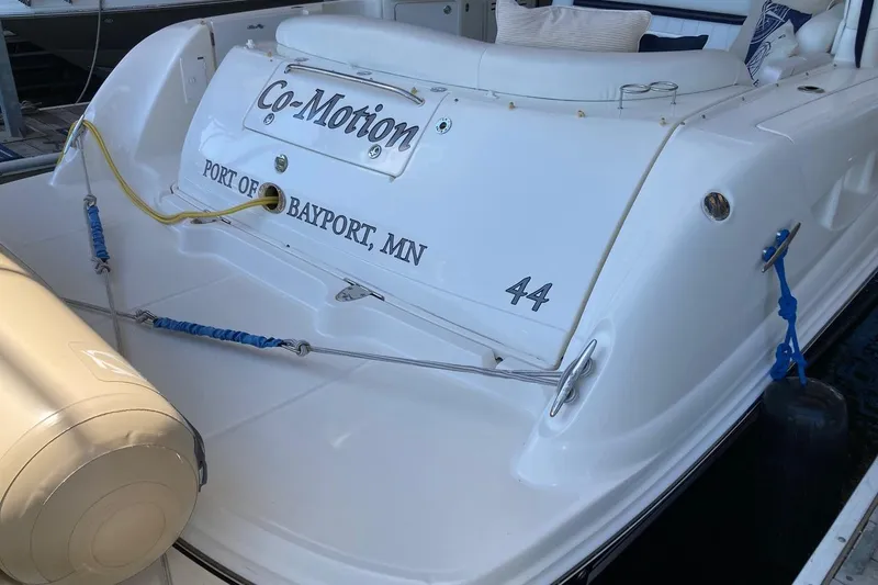 Slide: The Image of 2008 Sea Ray 44 Sundancer boat docked, named "Co-Motion," Bayport, MN. - 22