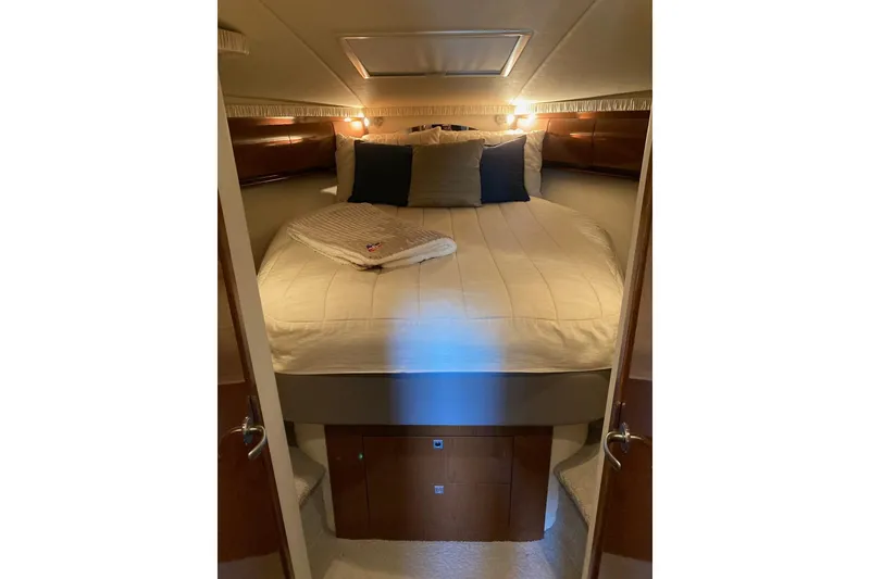 Slide: The Image of Luxurious cabin interior of 2008 Sea Ray 44 Sundancer yacht with cozy bedding. - 37