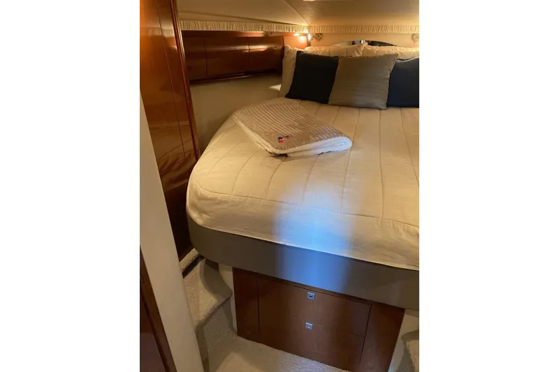Slide: The Image of Luxurious cabin interior of 2008 Sea Ray 44 Sundancer yacht with cozy bedding. - 38