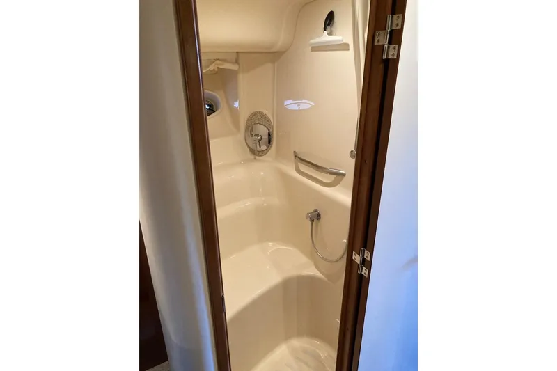 Slide: The Image of Shower area inside 2008 Sea Ray 44 Sundancer yacht, featuring sleek design and fixtures. - 40
