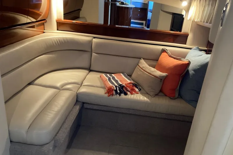 Slide: The Image of Luxurious interior of 2008 Sea Ray 44 Sundancer yacht with cozy seating and cushions. - 47
