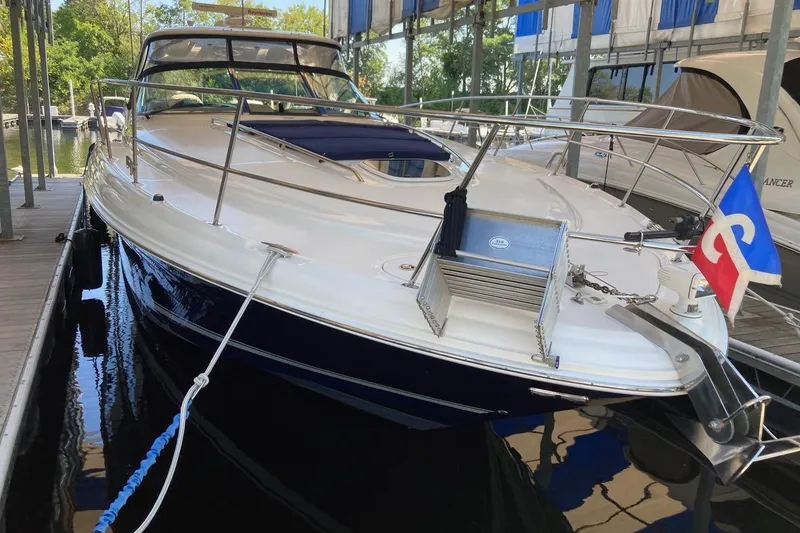 Slide: The Image of 2008 Sea Ray 44 Sundancer yacht docked, featuring sleek design and modern amenities. - 6