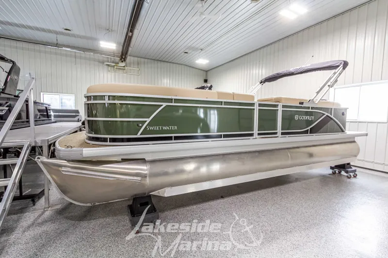 The Image of 2025 Godfrey Sweetwater 2286 C pontoon boat in showroom. - 1