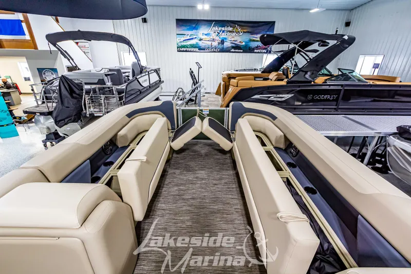 Slide: The Image of 2025 Godfrey Sweetwater 2286 C pontoon boat interior at Lakeside Marina showroom. - 11
