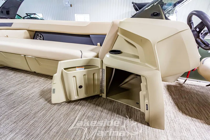 Slide: The Image of 2025 Godfrey Sweetwater 2286 C boat interior with open storage compartment. - 16
