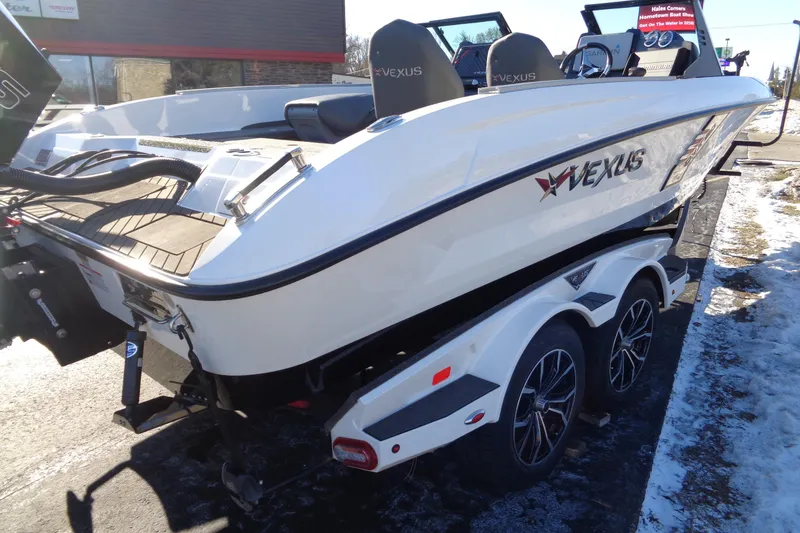 Slide: The Image of 2021 Vexus DVX20 boat on trailer, rear view in outdoor setting. - 14