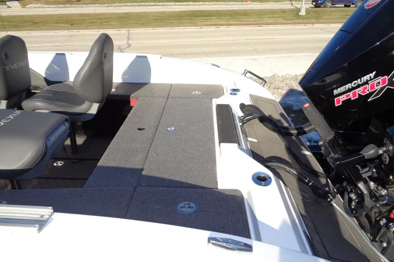 Slide: The Image of 2021 Vexus DVX20 boat interior with Mercury Pro motor and seating. - 20