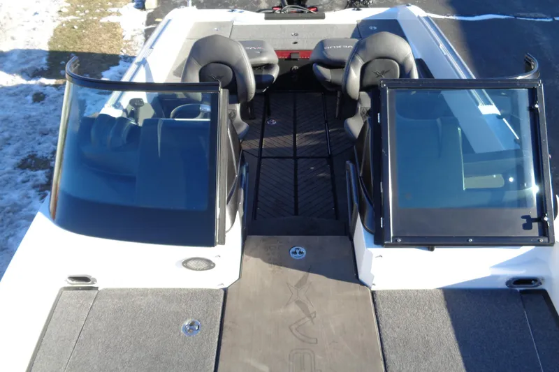 Slide: The Image of 2021 Vexus DVX20 boat interior with dual windshields and seating, viewed from above. - 24