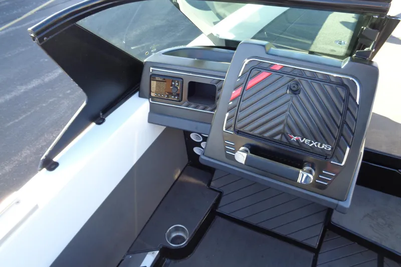 Slide: The Image of 2021 Vexus DVX20 boat dashboard with modern controls and sleek design. - 27